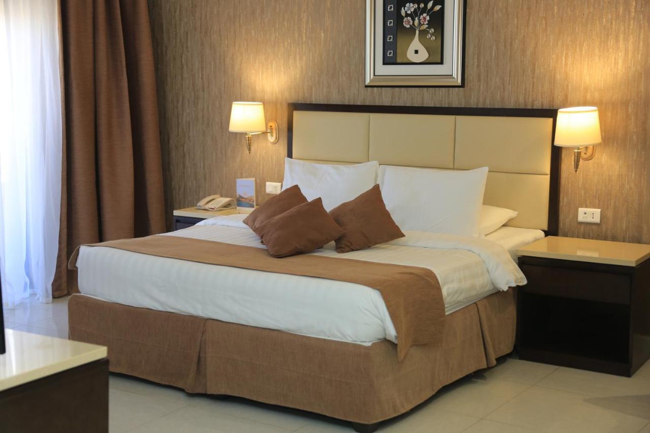 Grand East Hotel - Resort & Spa Dead Sea Sweimeh Quarto foto